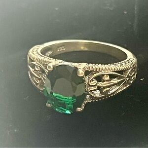 sterling silver 925 ring with a simulated emerald  stone.